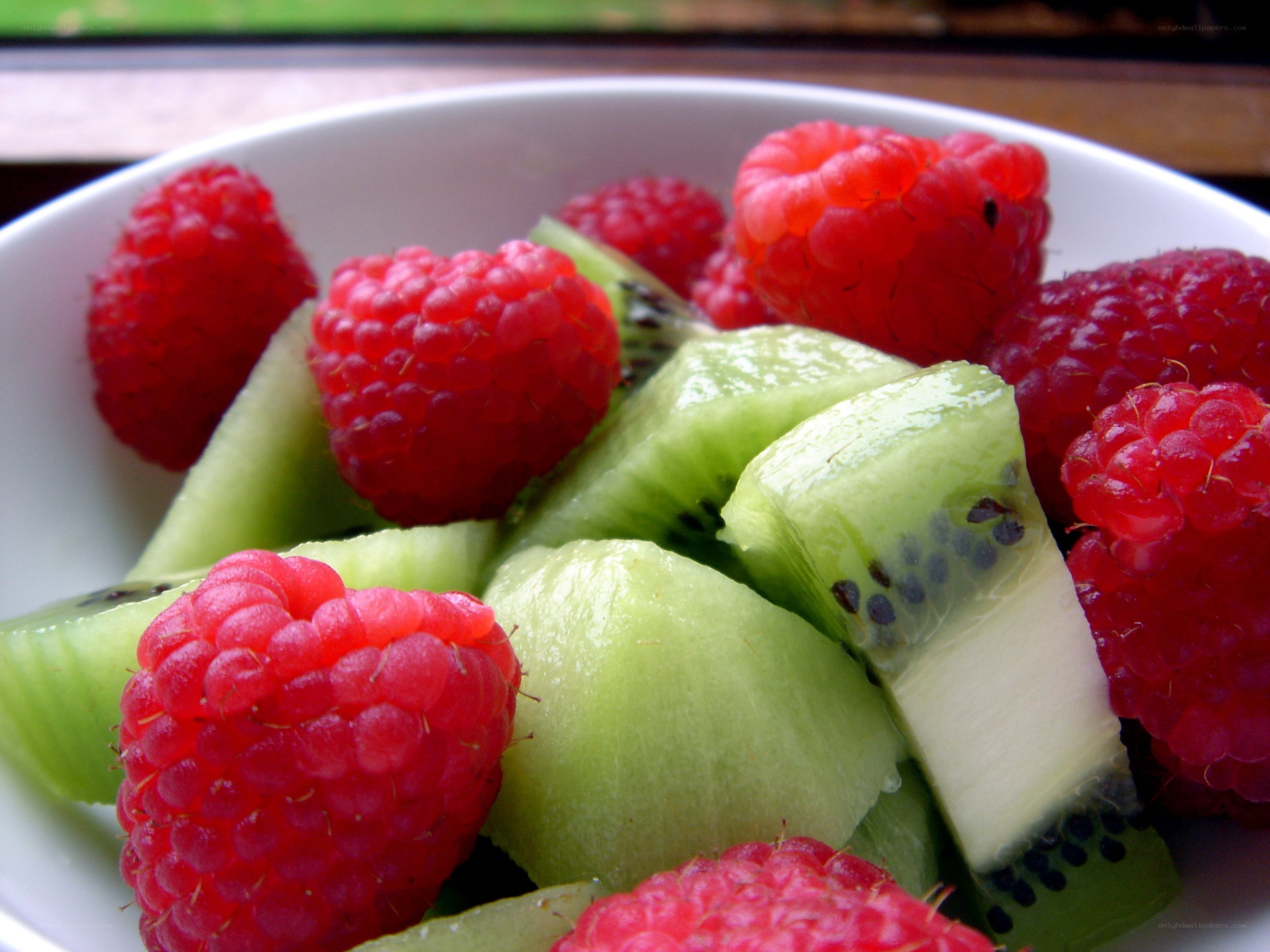 raspberries and kiwi fruit
