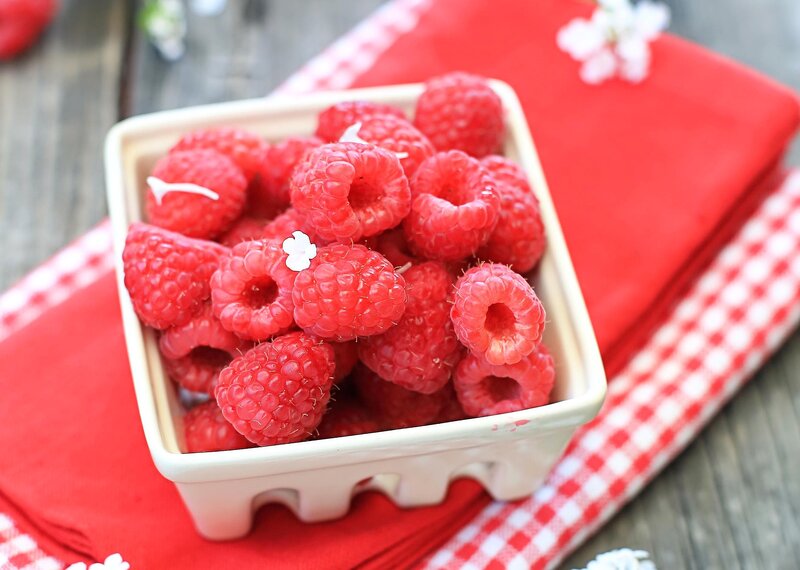 Raspberries in a Container