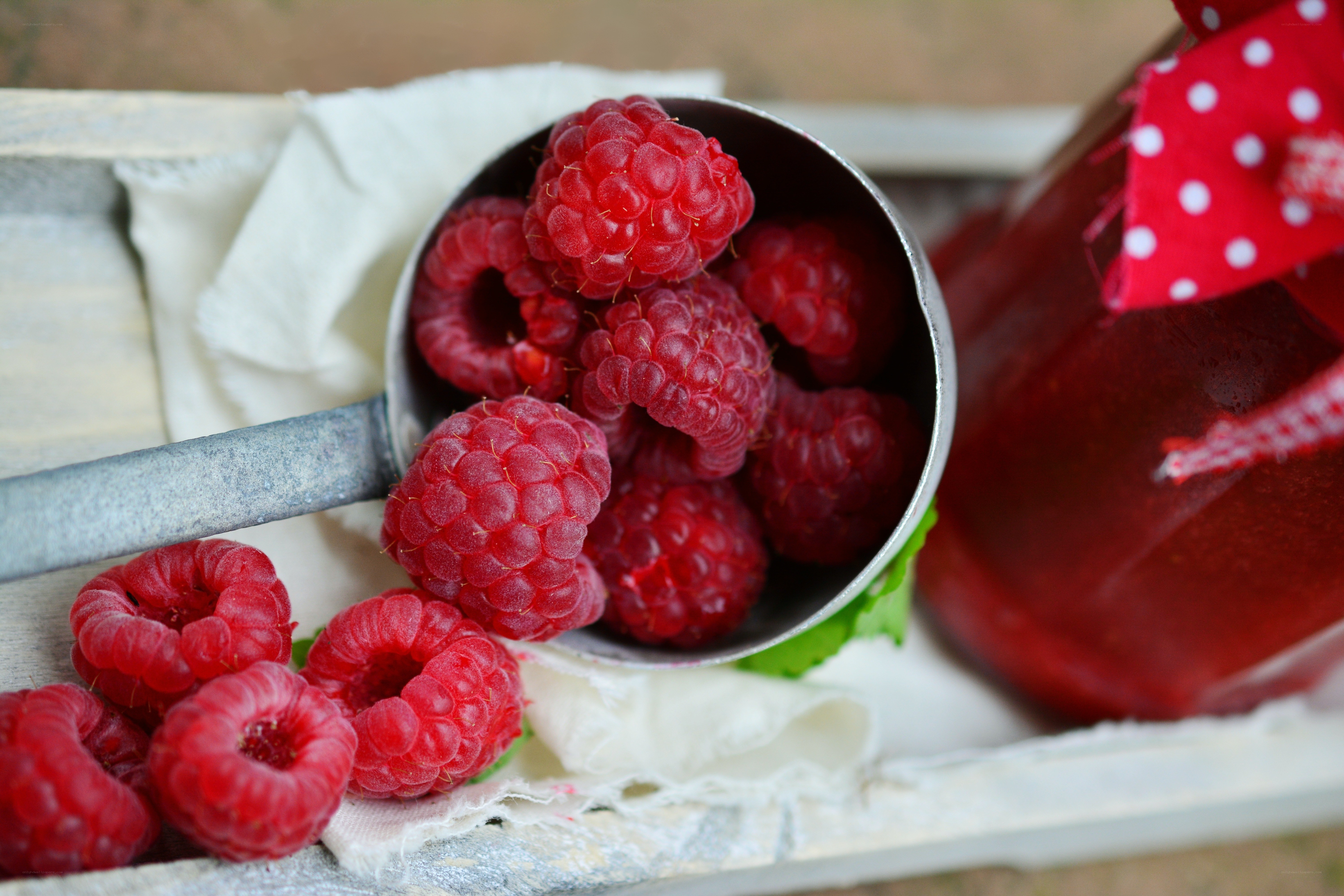 Raspberries in a scoop