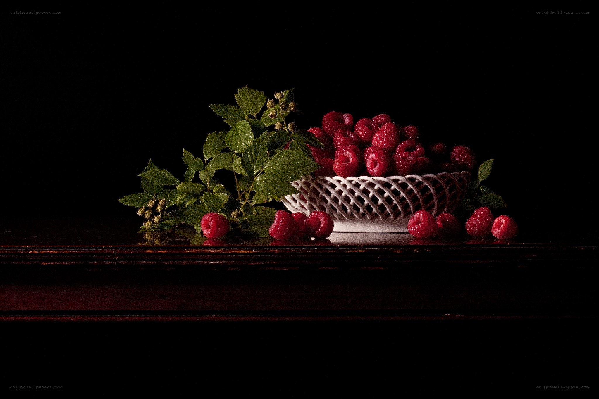 Raspberries in a white basket