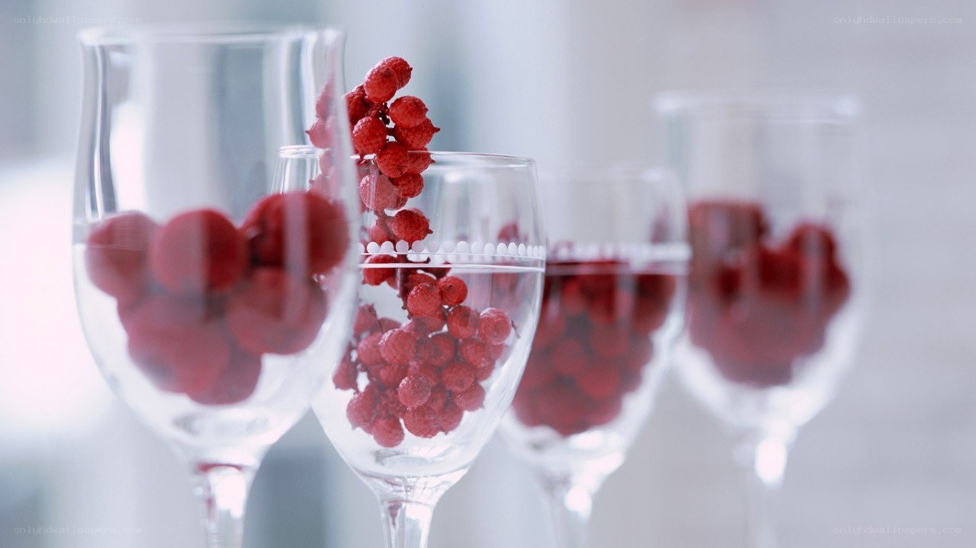 Raspberries in wine glasses