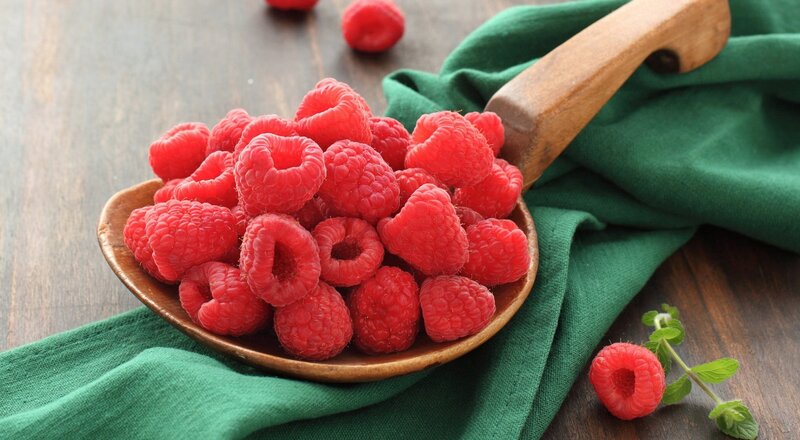 Raspberries in Wooden Bowl
