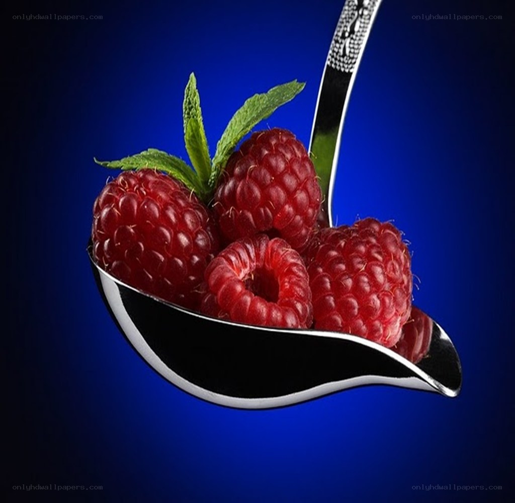 Raspberries on a spoon