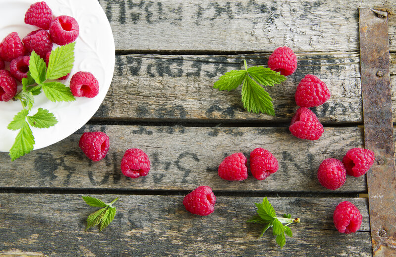 Raspberries on Wood