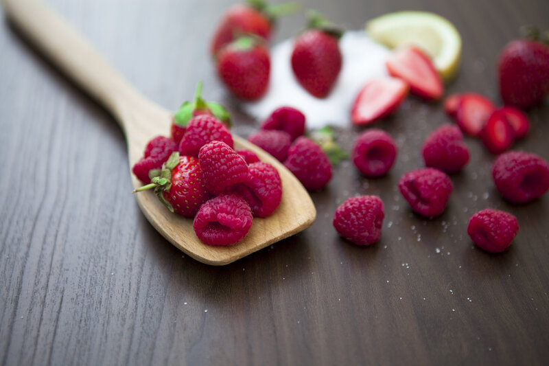 Raspberries on Wooden Spoon