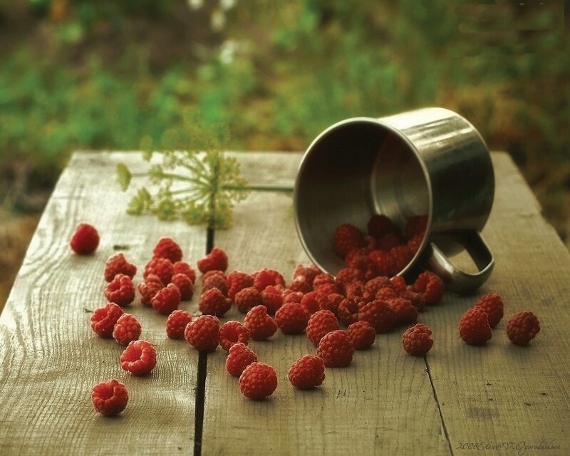 Raspberries on Wooden Table