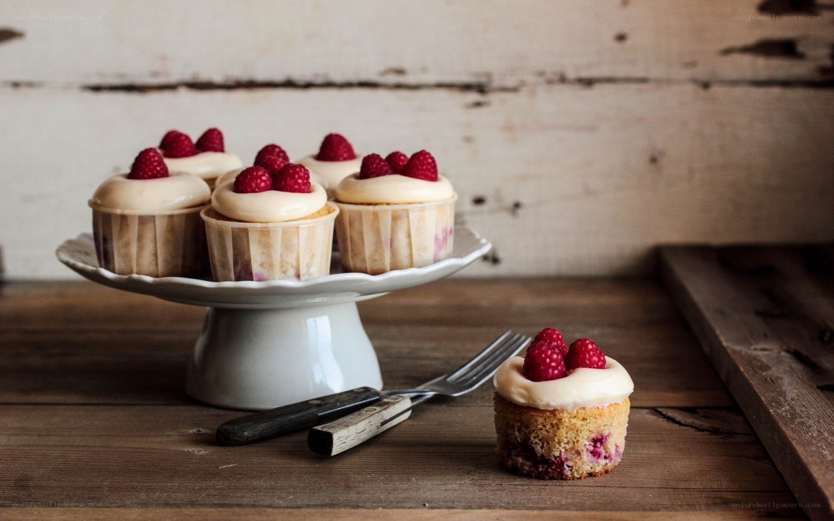 Raspberry cupcakes on a stand
