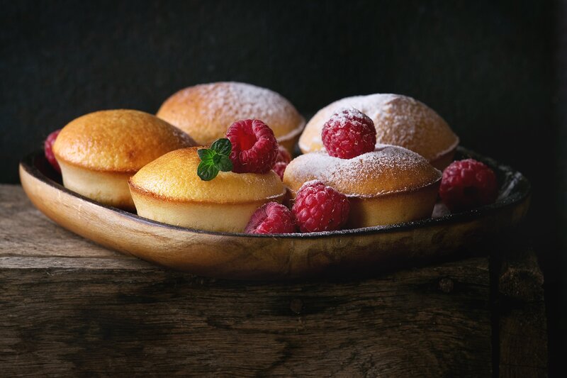 Raspberry Muffins on Wood