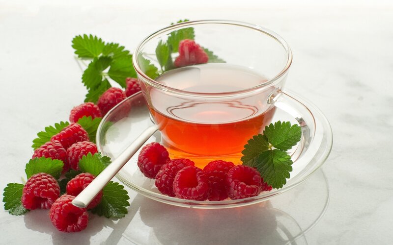 Raspberry Tea in Glass Cup — Red, Calm, Photograph, Raspberries, Leaves, Saucer