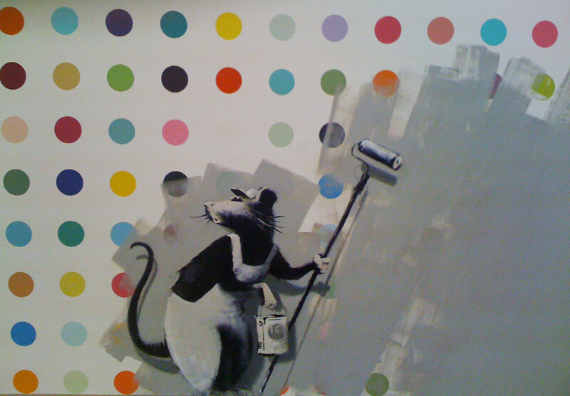 rat painting a wall