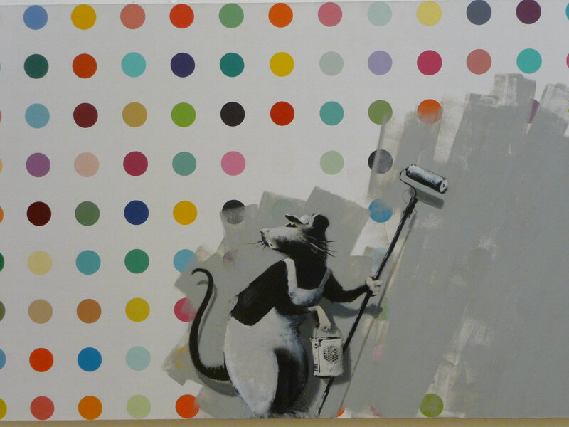 rat painting over polka dots