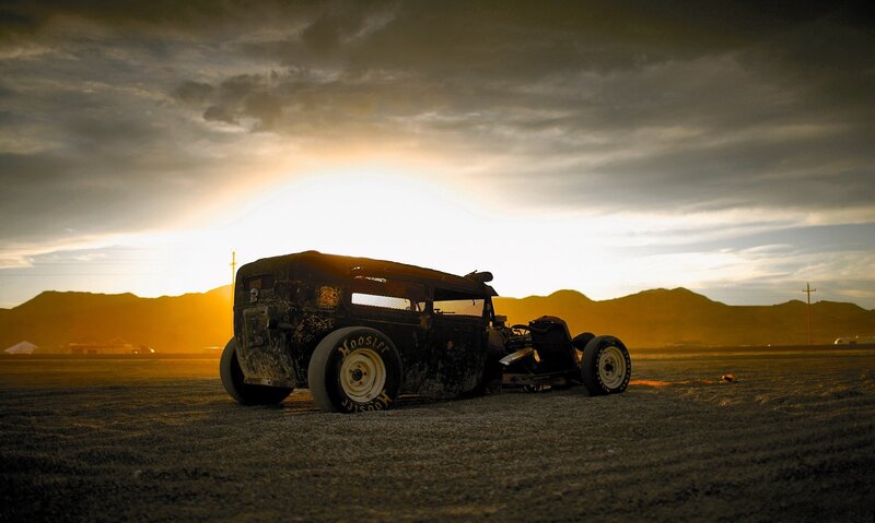 Rat rod car at sunset