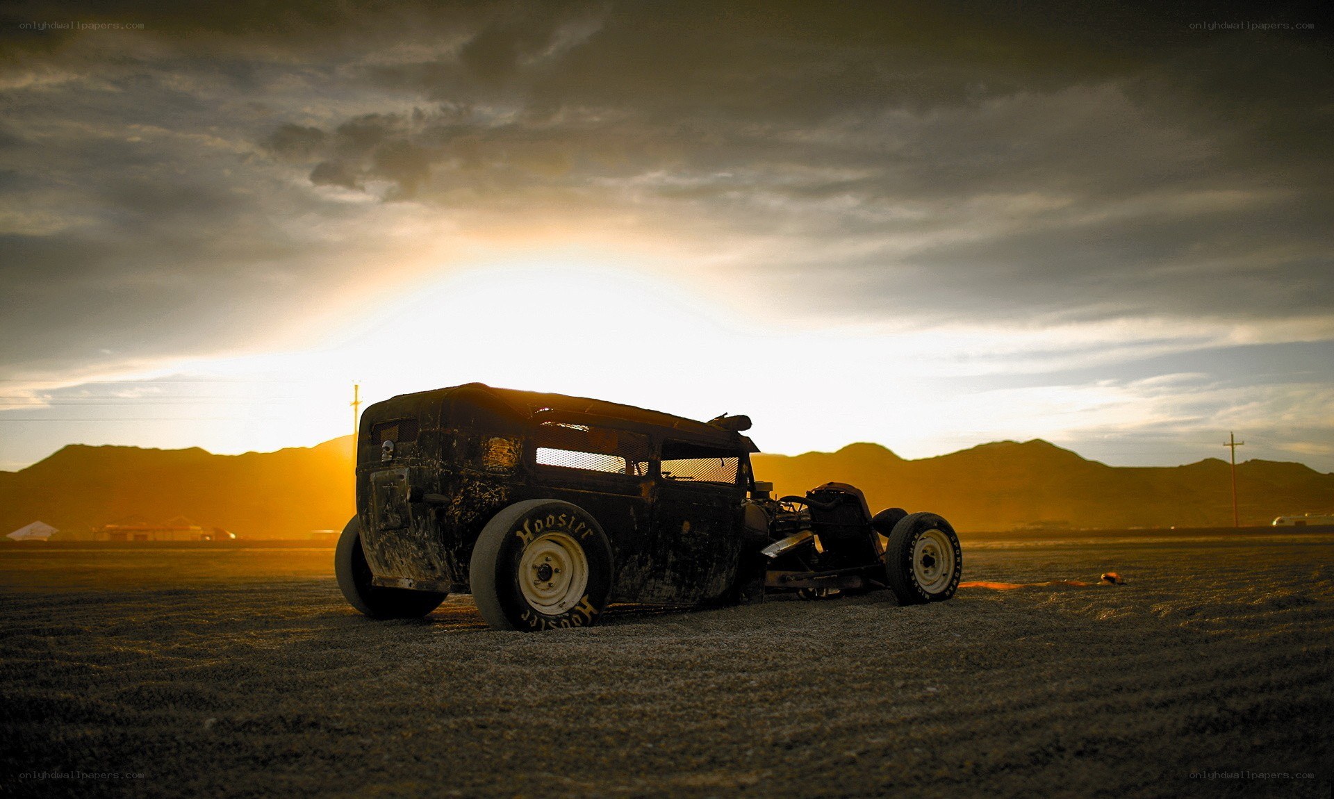 Rat rod car at sunset