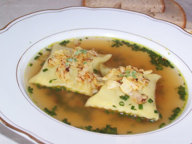 Ravioli soup with herbs