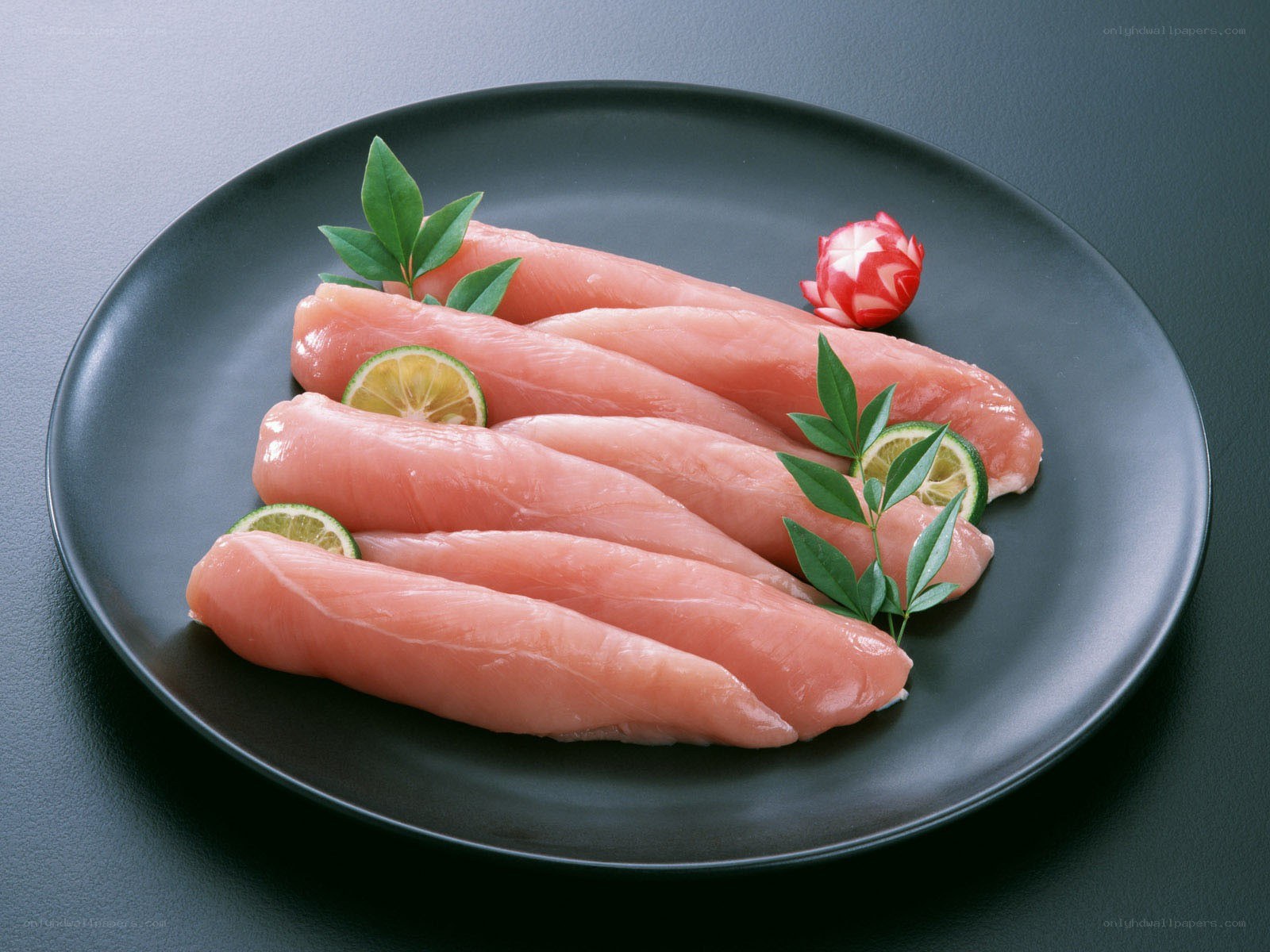 Raw fish fillets on a plate