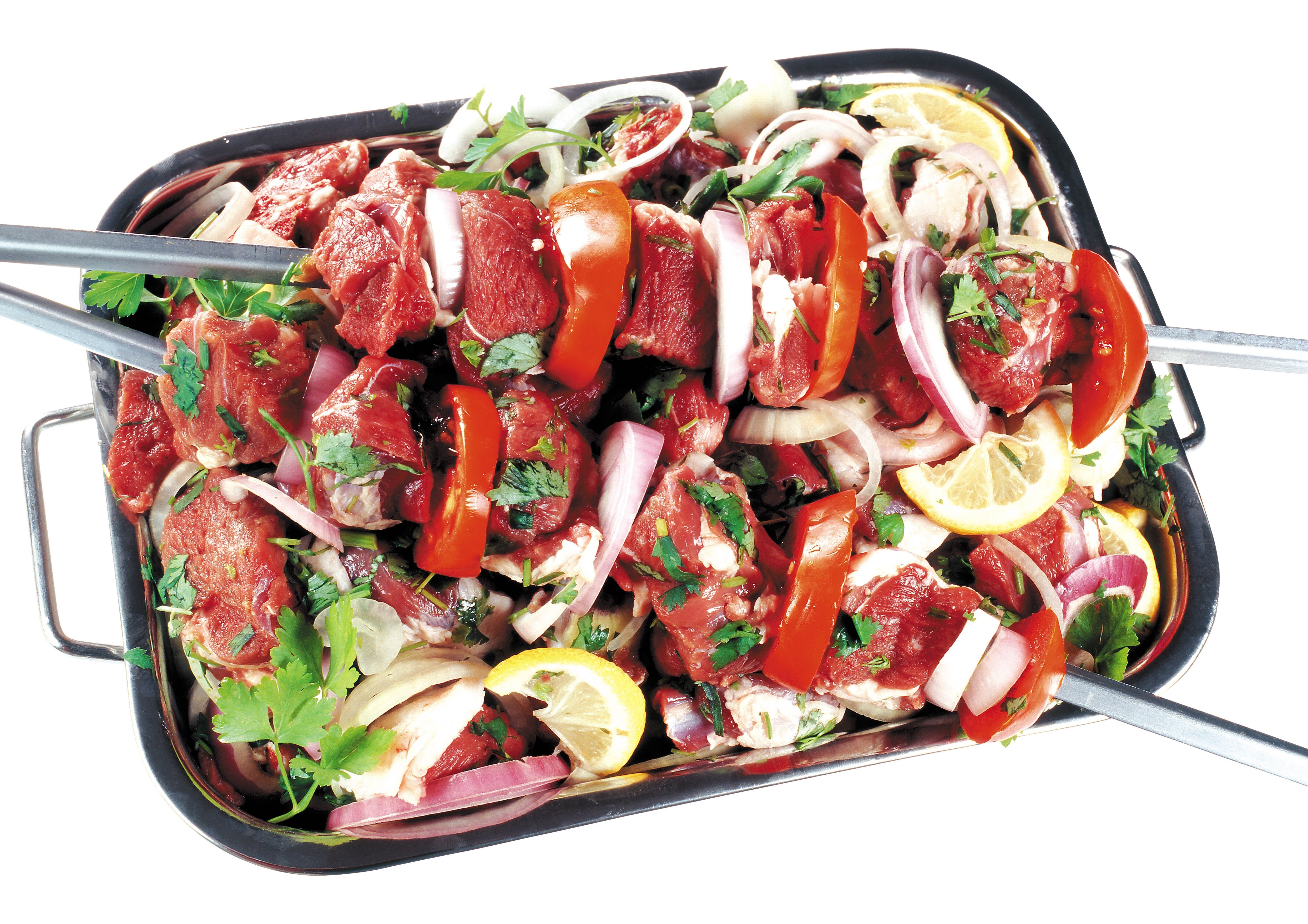 Raw meat skewers with vegetables