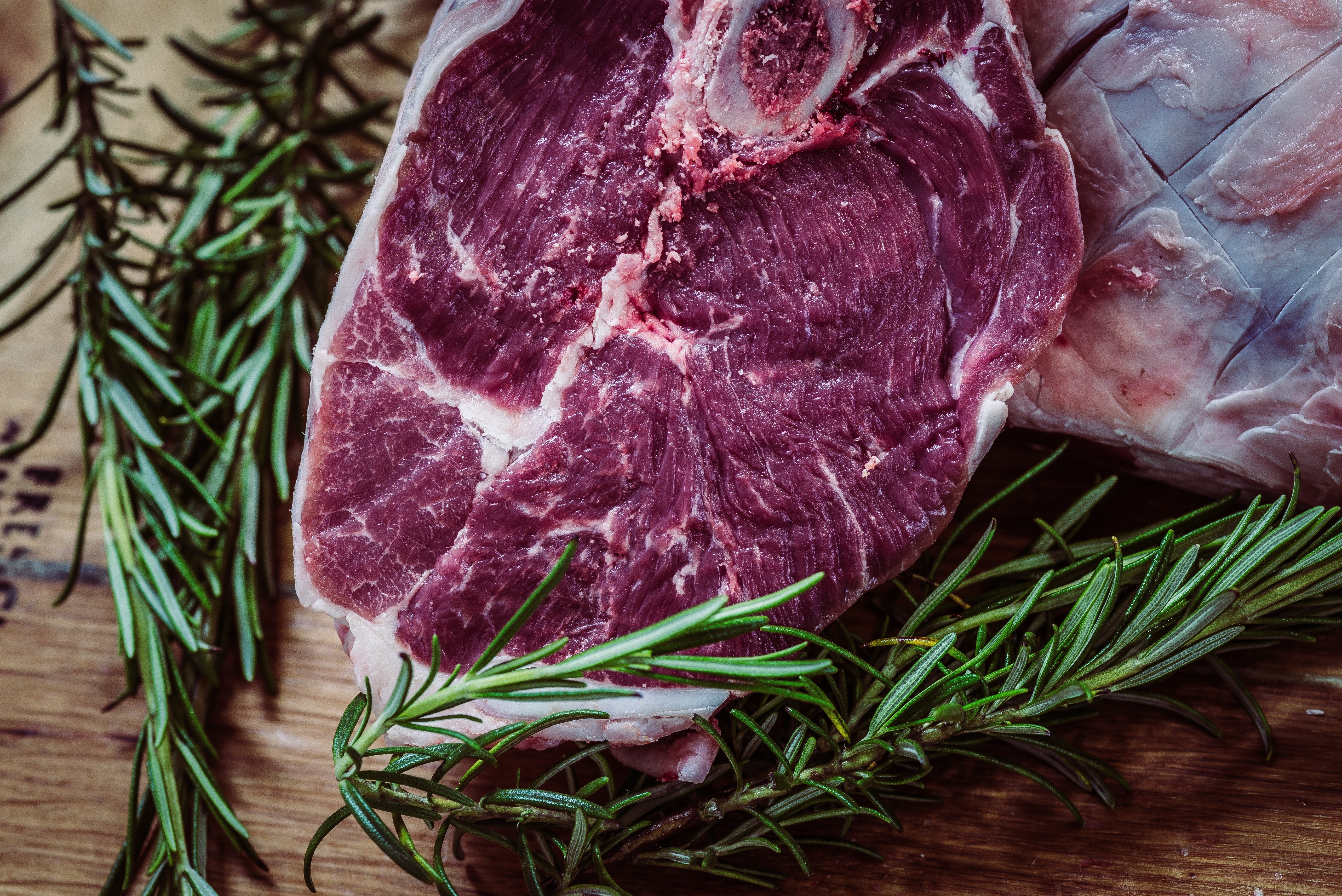 Raw meat with rosemary