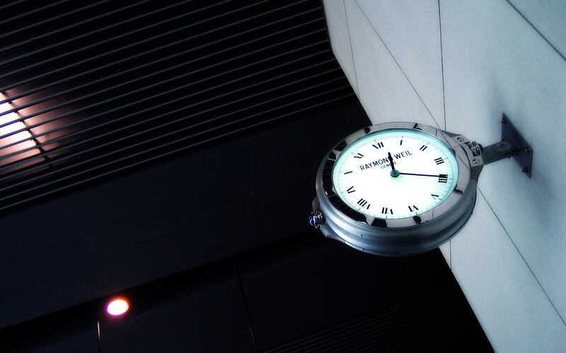 Raymond Weil clock on wall