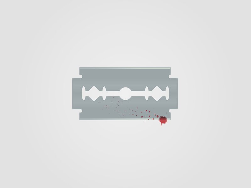 razor blade with blood splatter