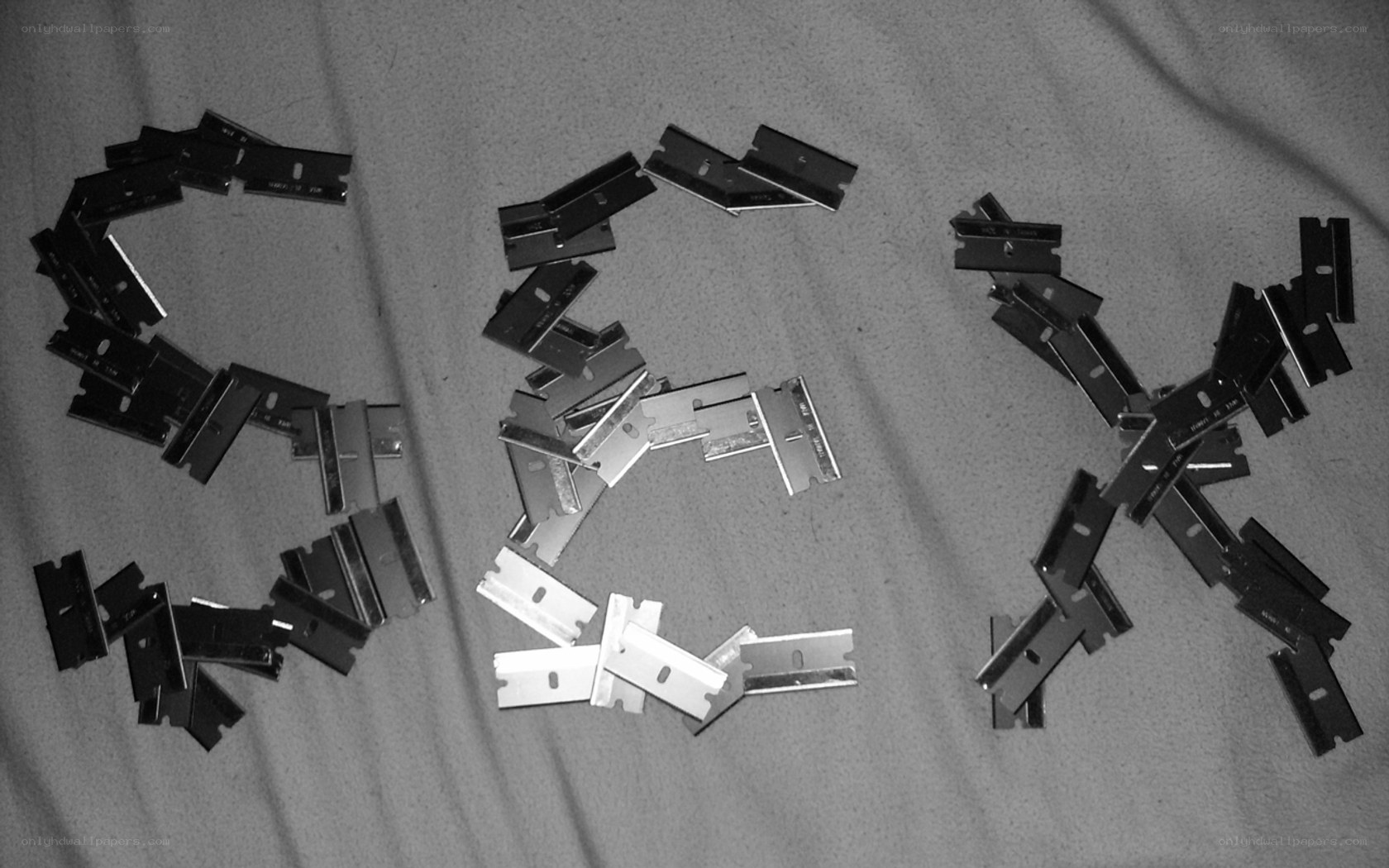 razor blades arranged in a pattern