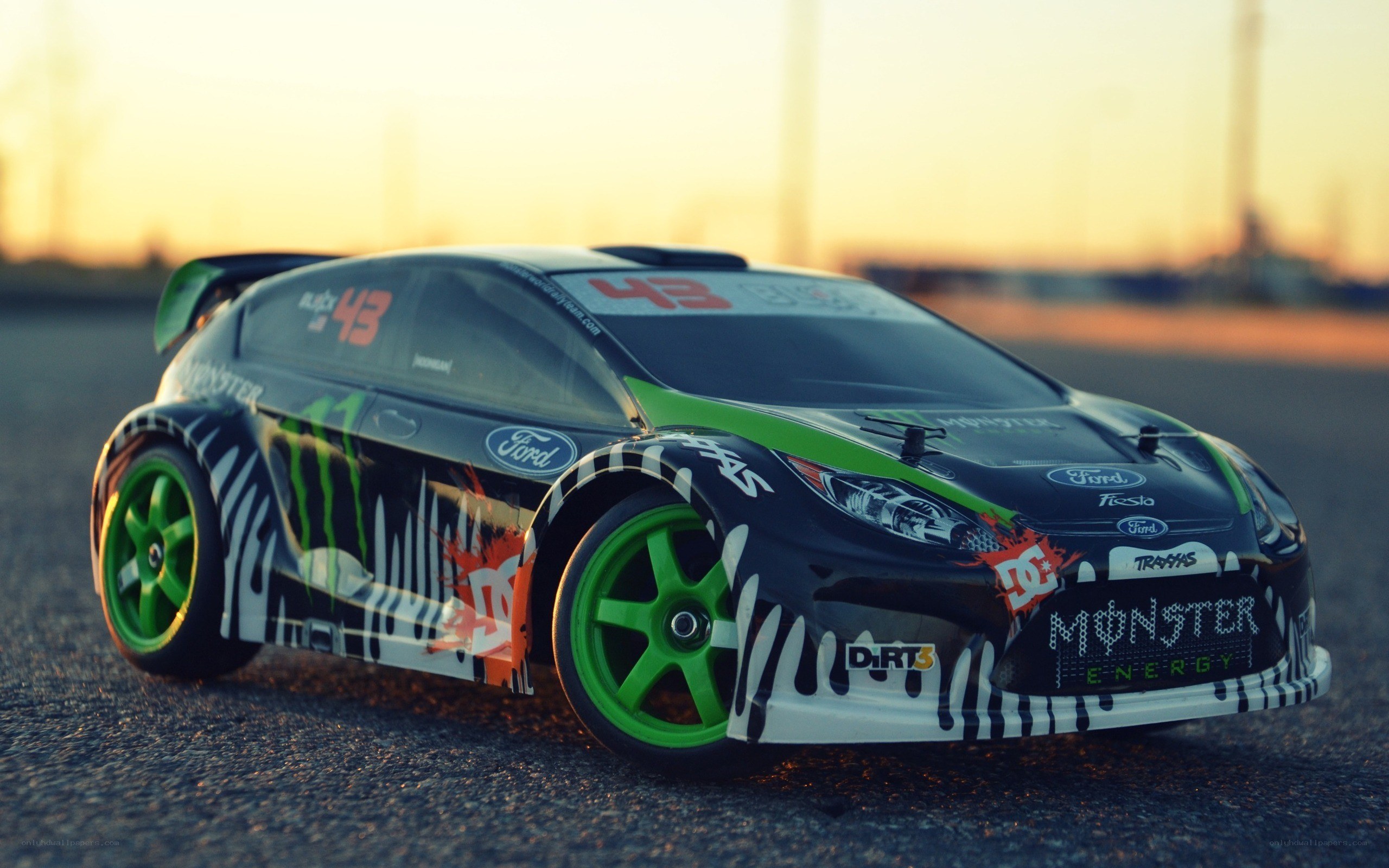 RC car on asphalt at sunset