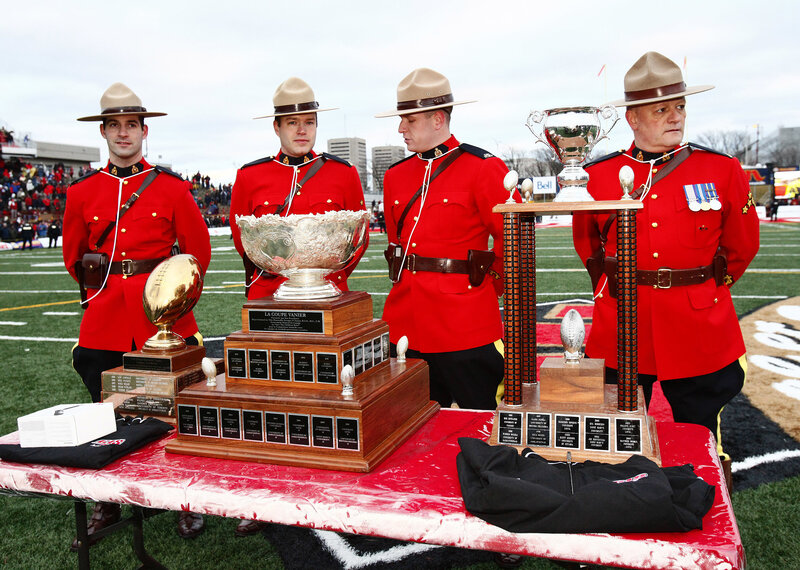 RCMP officers with trophies