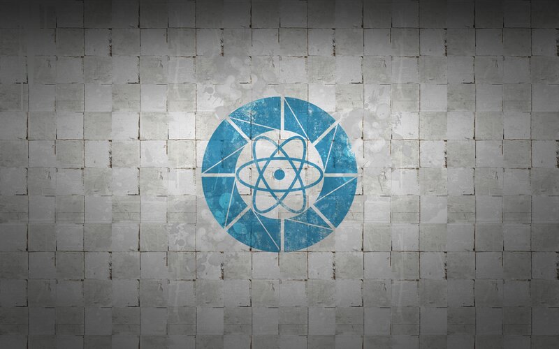 React logo on tiled wall
