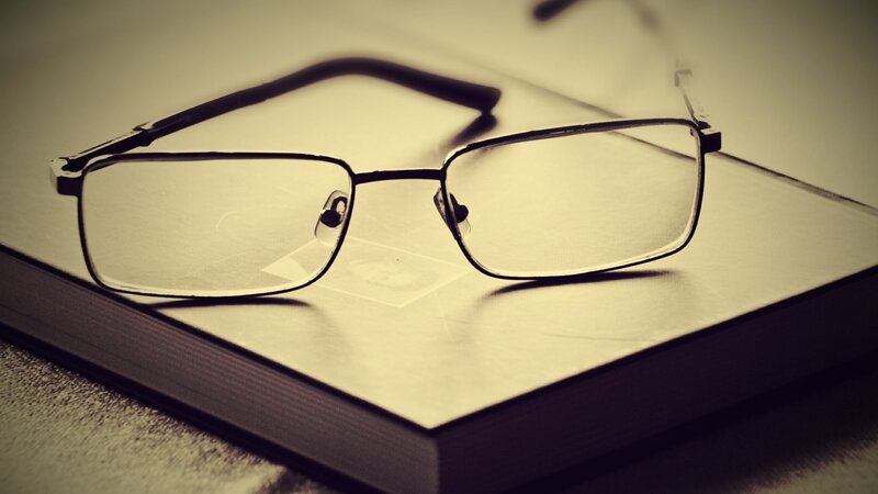 Reading Glasses on Book