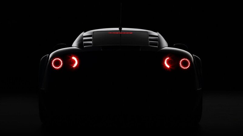 Rear of Black Sports Car — Dramatic, Night, Photograph, Taillights
