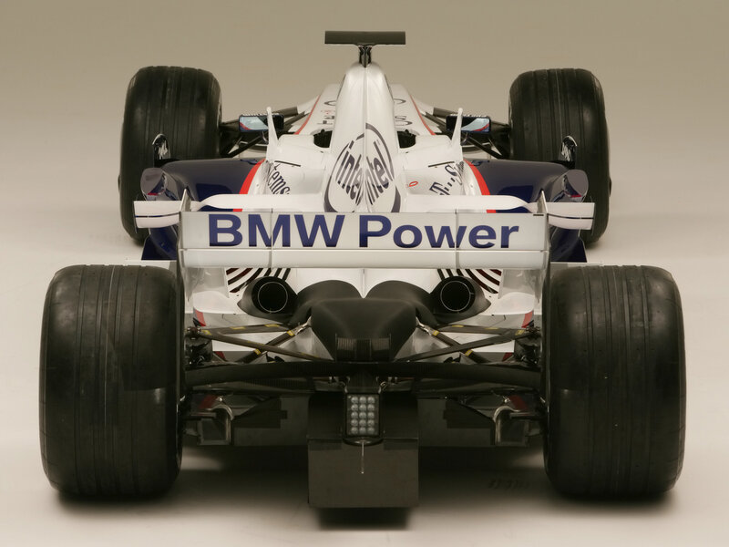 Rear View of Formula One Car — White