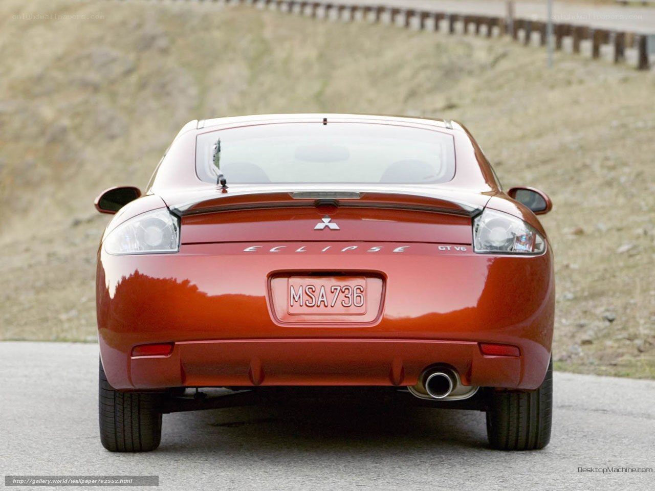 rear view of red mitsubishi eclipse