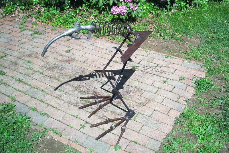 Recycled metal bird sculpture