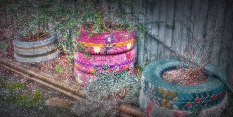 Recycled tire planters in garden