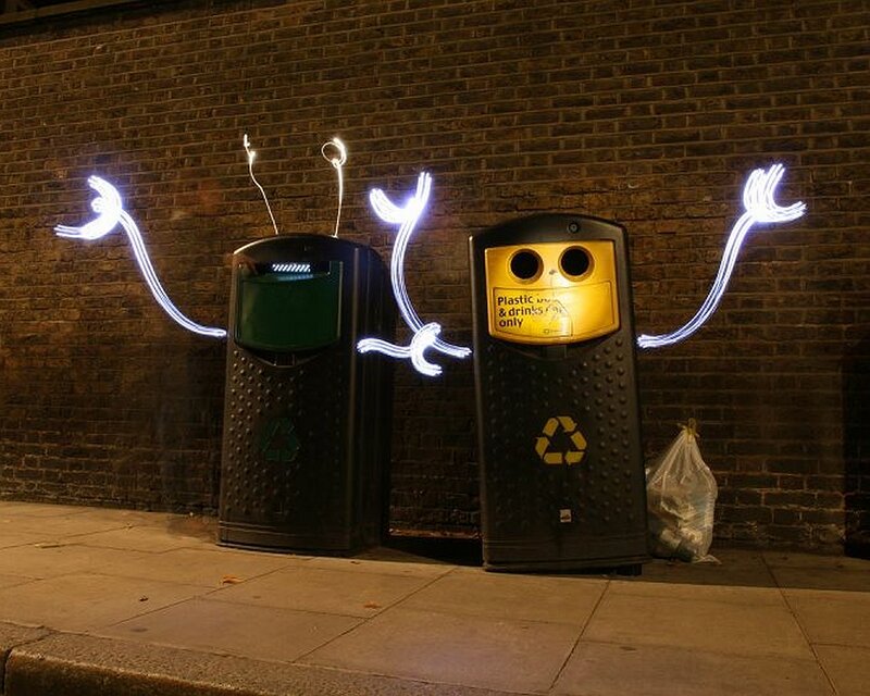 Recycling bins with light art