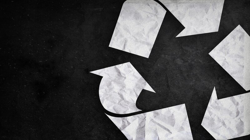 recycling symbol on dark background