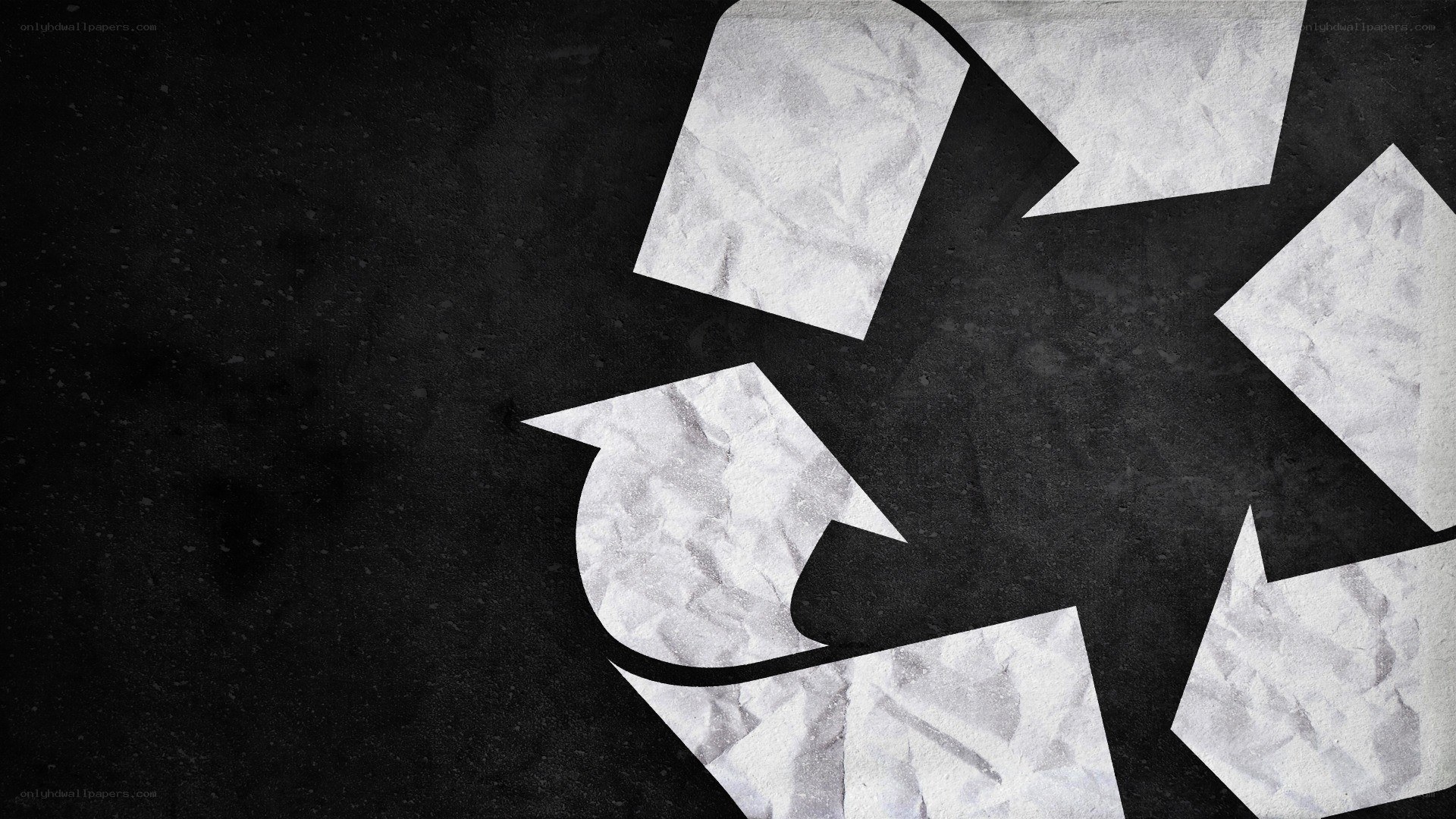 recycling symbol on dark background
