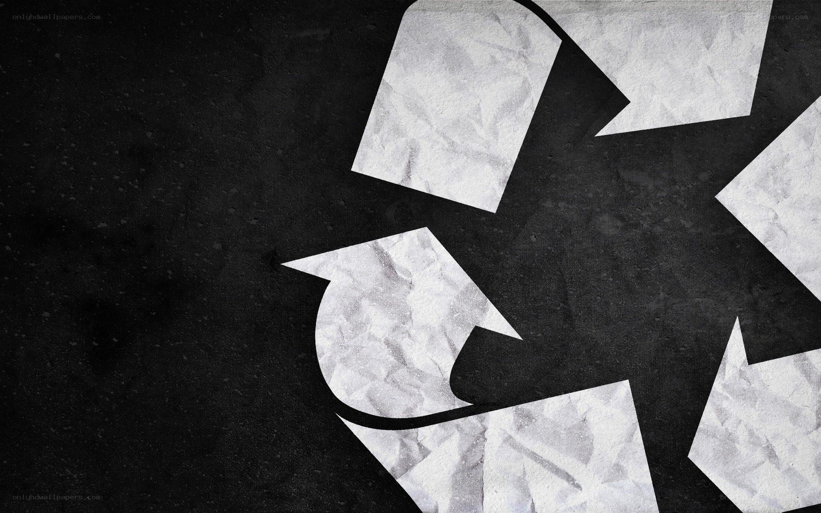 recycling symbol on dark background