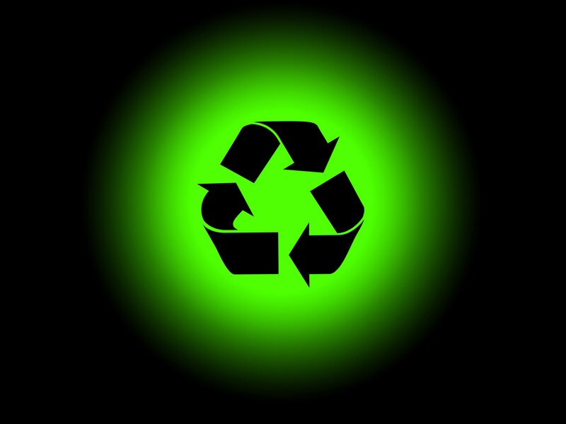 recycling symbol on green background