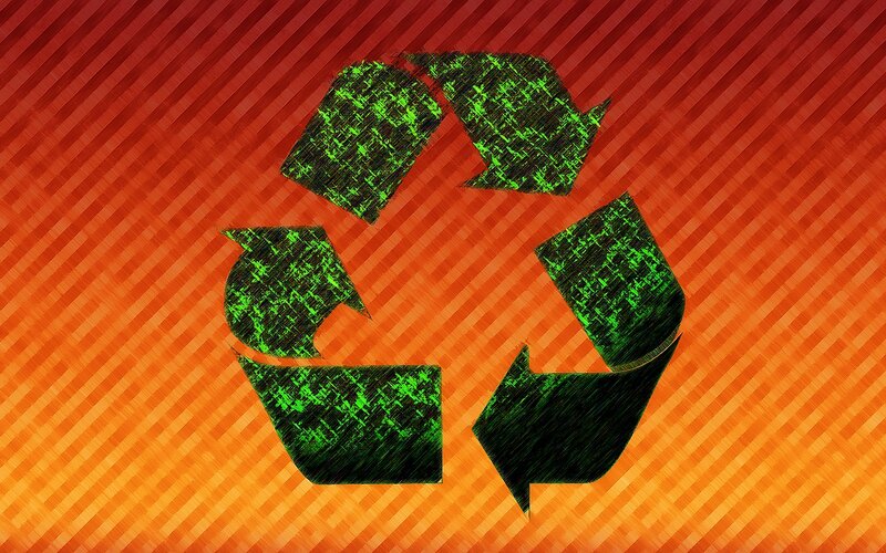 recycling symbol on striped background