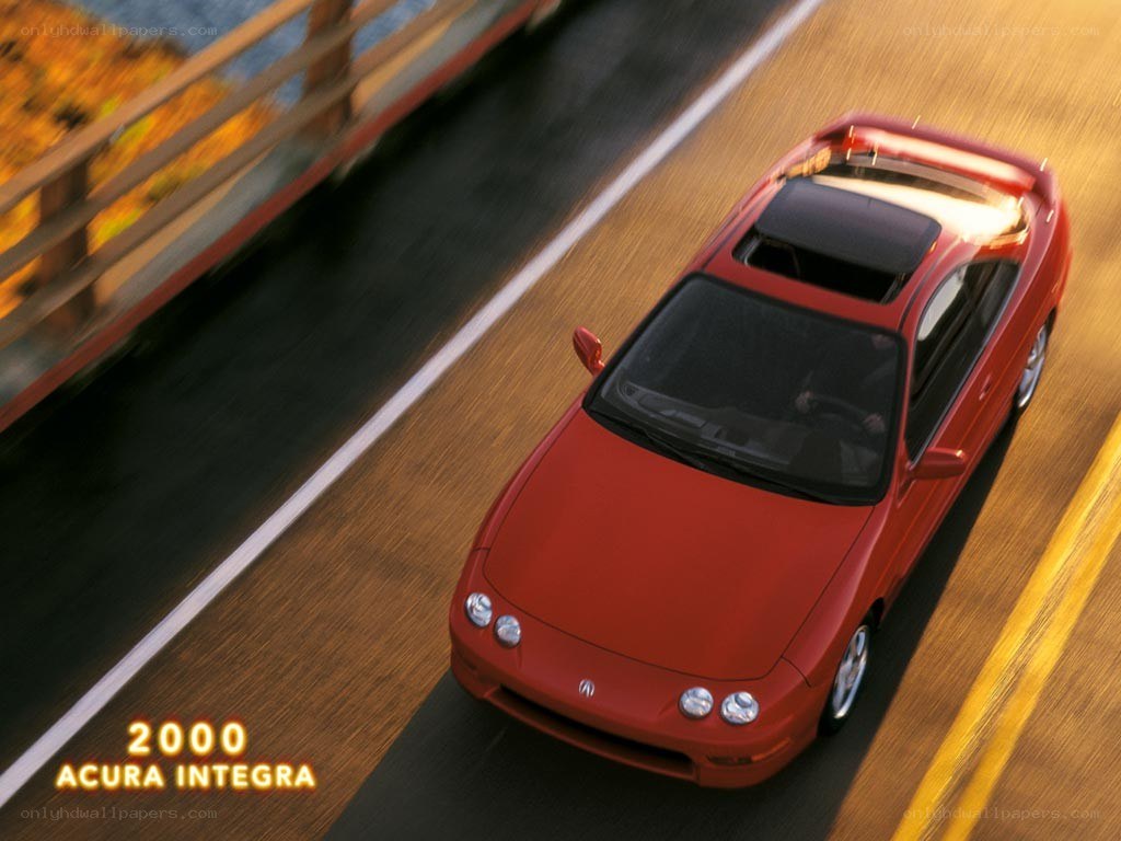 Red Acura Integra in motion