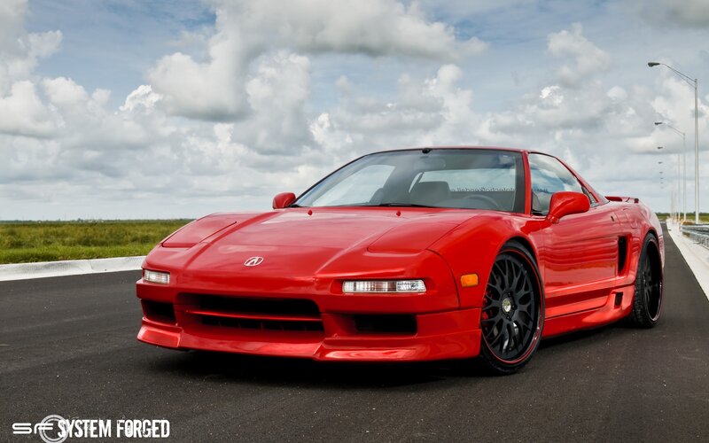 Red Acura NSX on a track