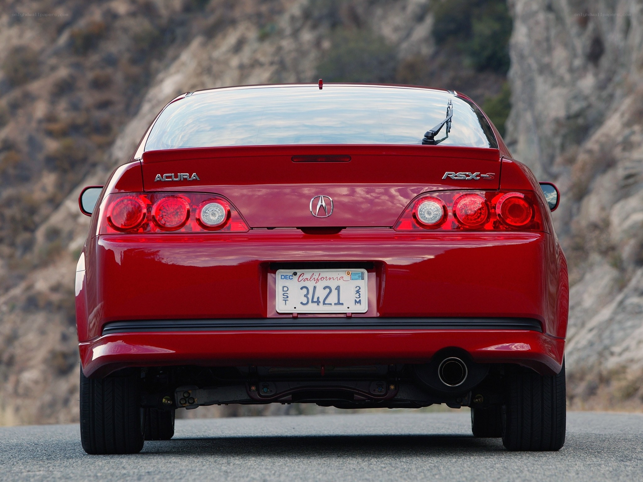 Red Acura RSX-S rear view