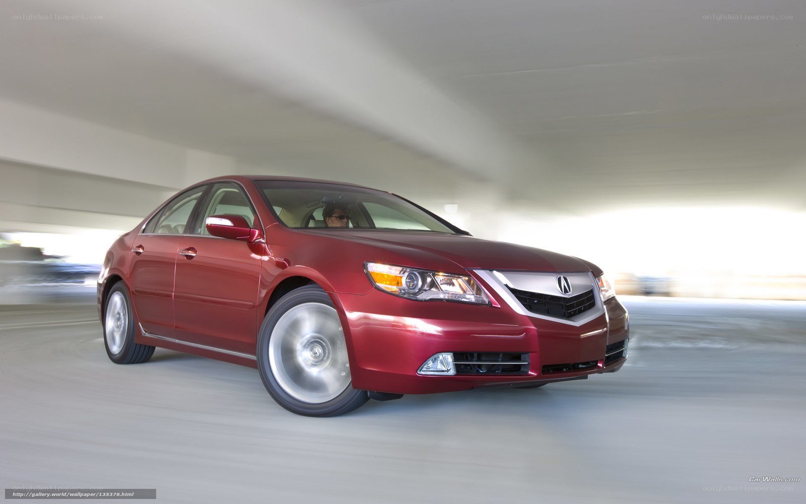 Red Acura TL in motion