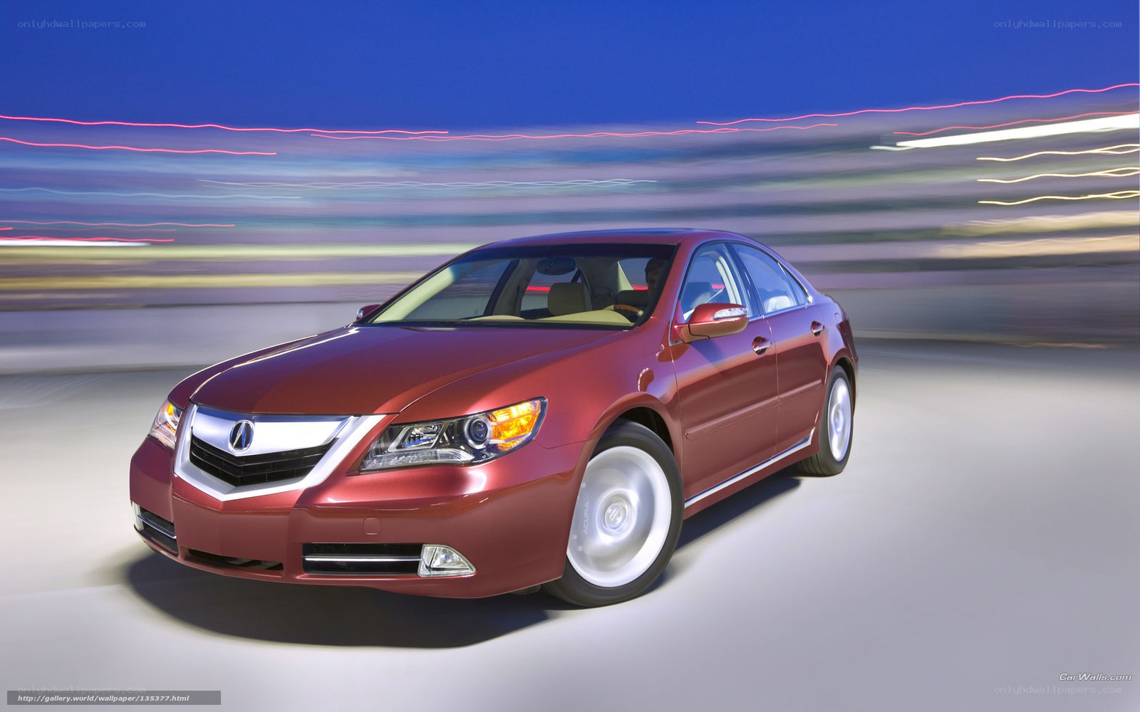Red Acura TL in motion