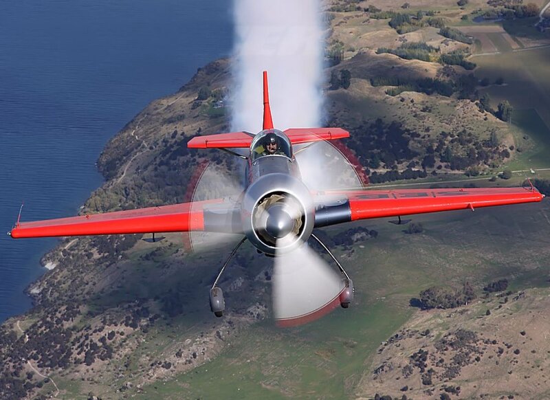 Red Aerobatic Plane — Dynamic, Afternoon
