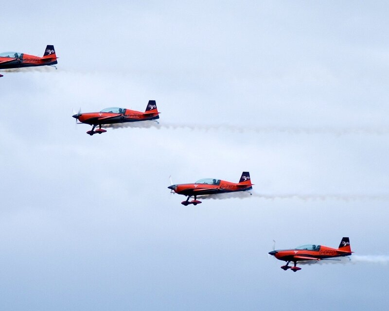 Red Aerobatic Planes — Dynamic, Photograph, Aircraft, Smoke Trails