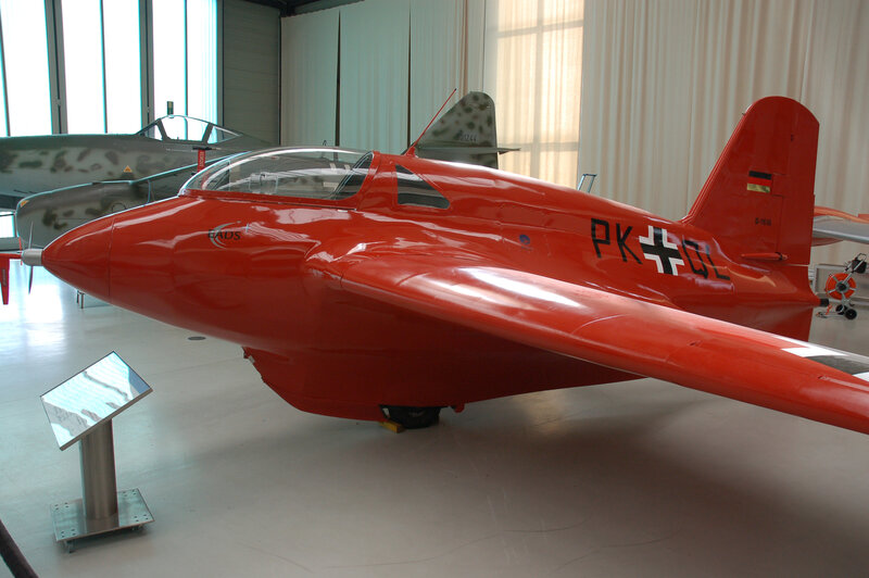 Red aircraft in museum display