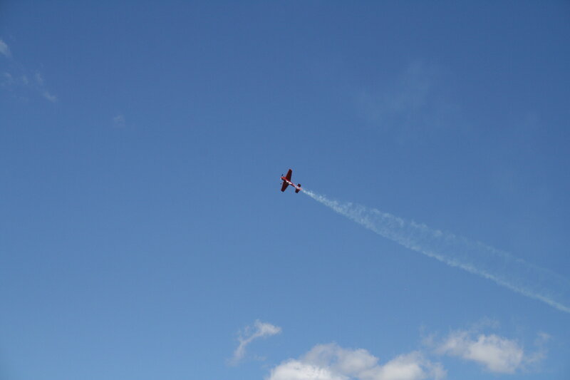 Red Airplane in Sky