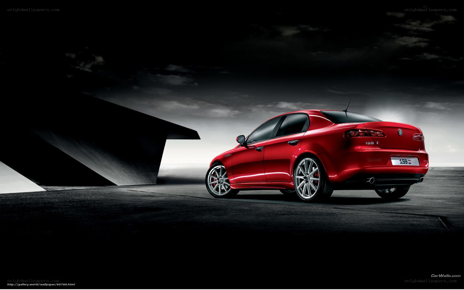 red alfa romeo 159 in dark setting