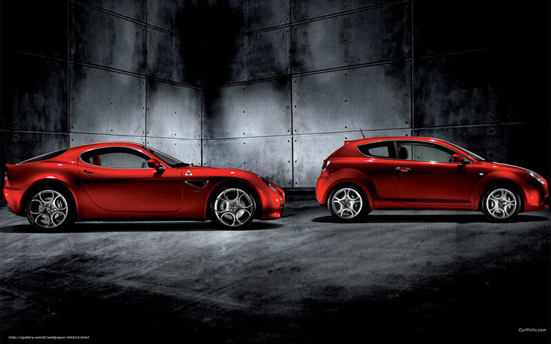 Red Alfa Romeo cars side by side